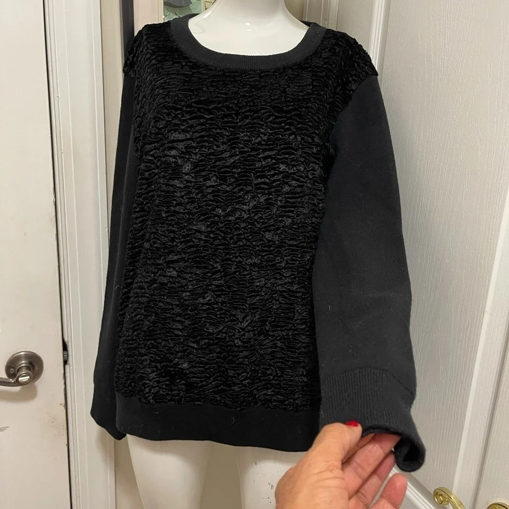Kate spade black sweater. Looks like Front made with the unique sheep fur.